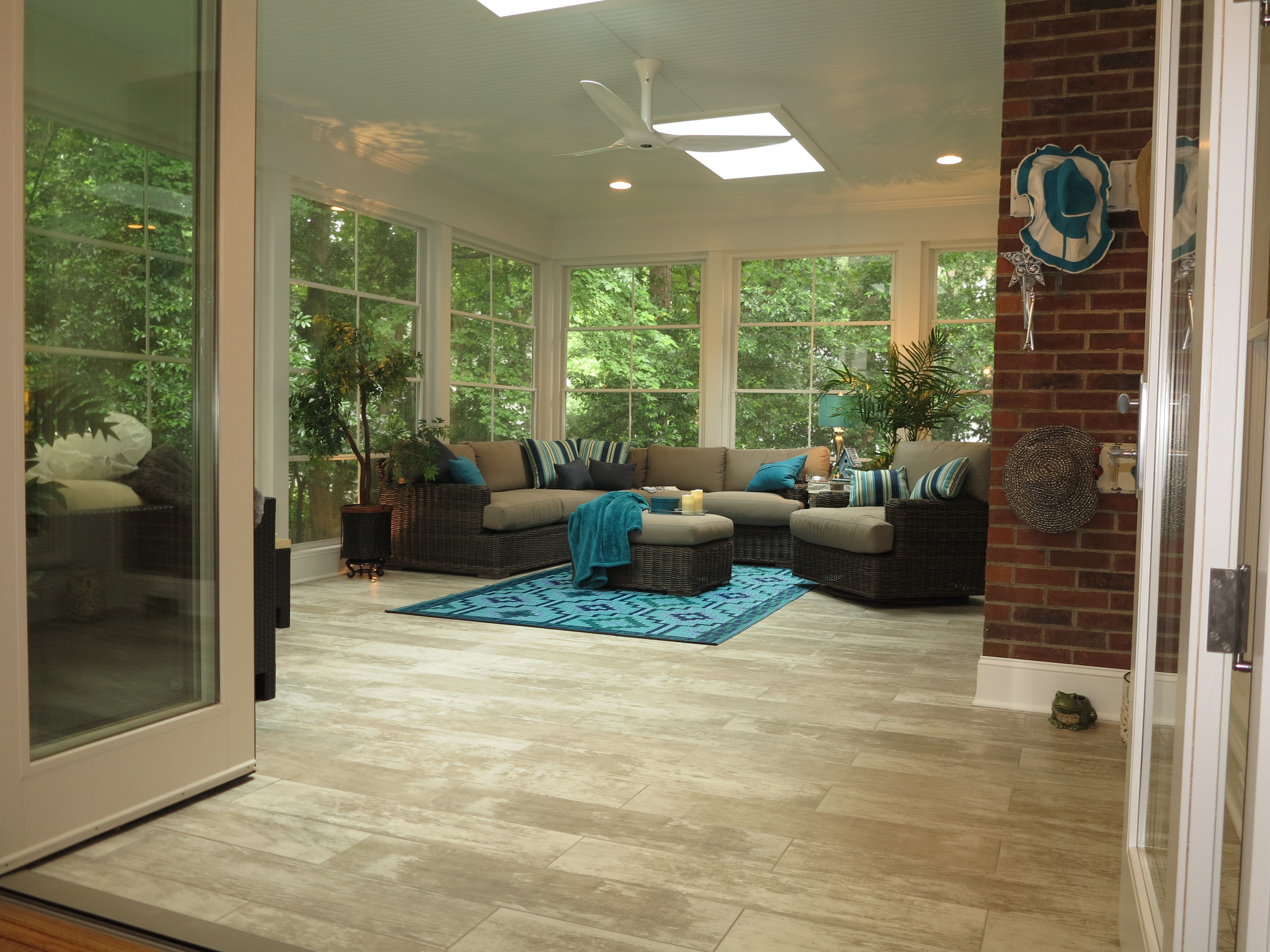 screened porch with tile floor