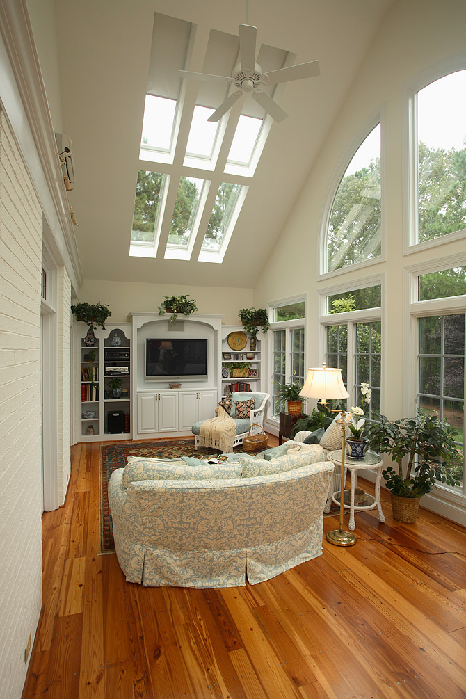 Sunroom addition with Velux skylights and heart pine flooring