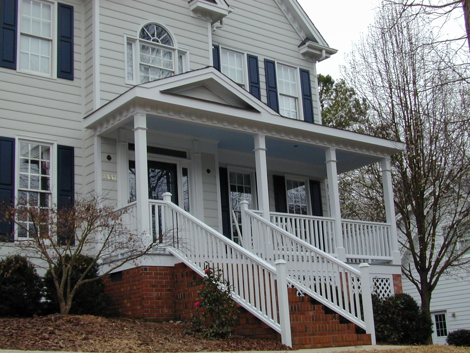 A house exterior after a front porch addition.